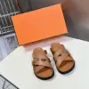 Hermès Women Tan Leather And Fabric Sandals product view 1