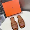 Hermès Women Brown Leather Flat Mules product view 1