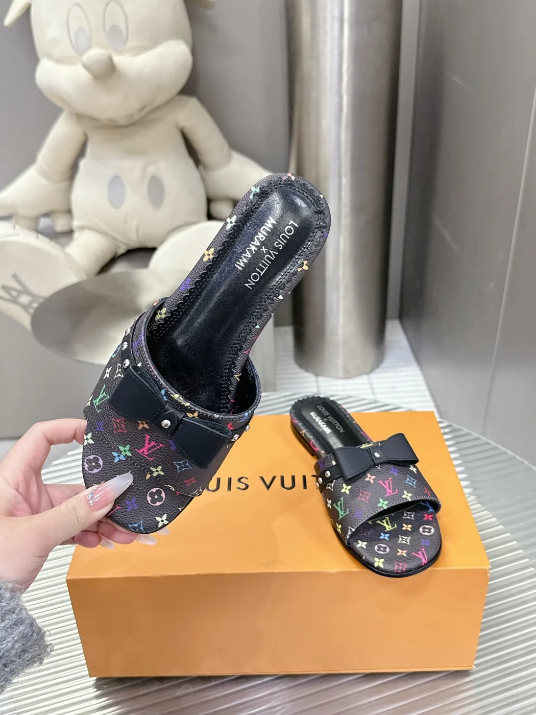 Louis Vuitton Women Black Patterned Leather Bow Slide Sandals product view 4