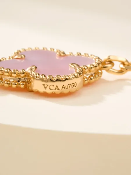 Van Cleef  Arpels Alhambra Pale Pink Clover and Gold-Tone Knot Bracelet product view 11