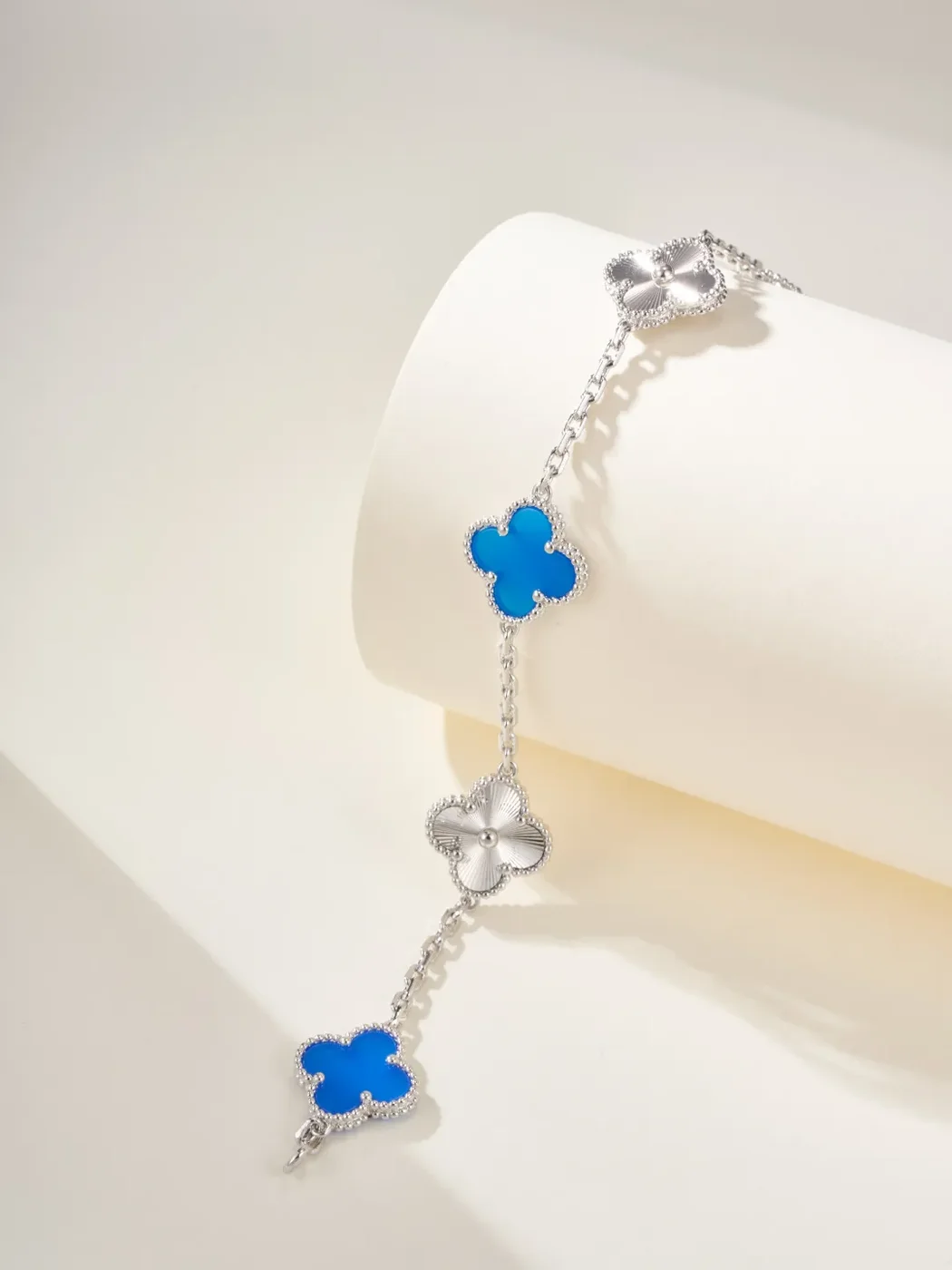 Van Cleef  Arpels Alhambra Blue Clover and Silver-Tone Knot Bracelet product view 3