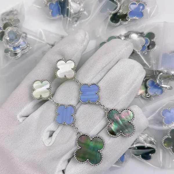 Van Cleef  Arpels Alhambra White Blue and Black Three-Motif Silver-Tone Drop Earrings product view 7