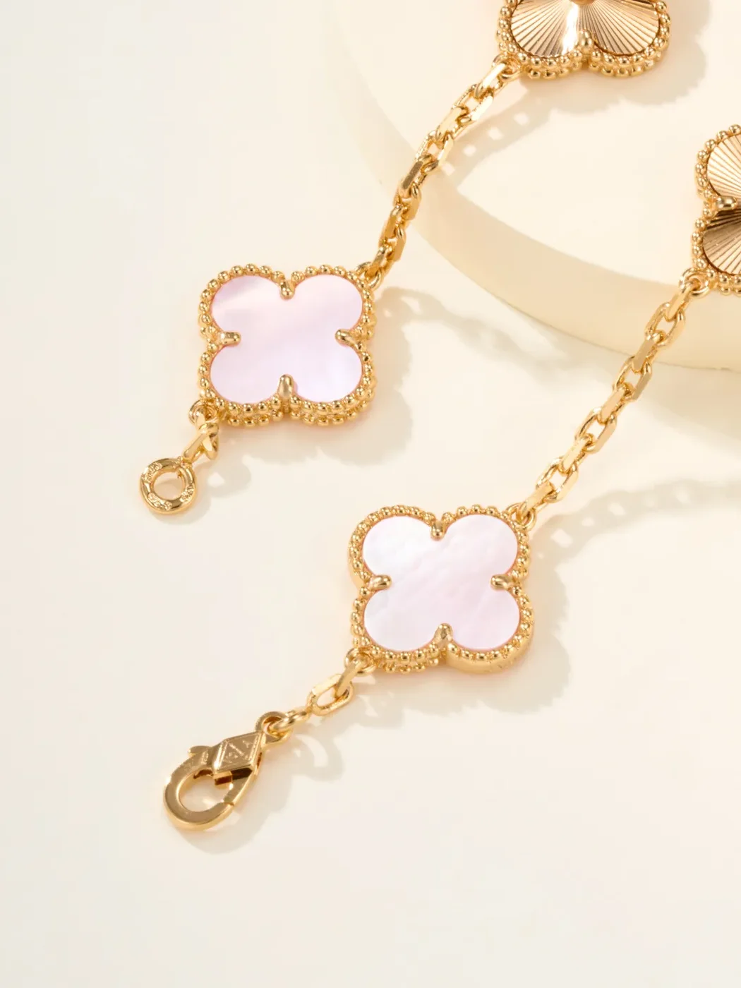 Van Cleef  Arpels Alhambra Pale Pink Clover and Gold-Tone Knot Bracelet product view 8