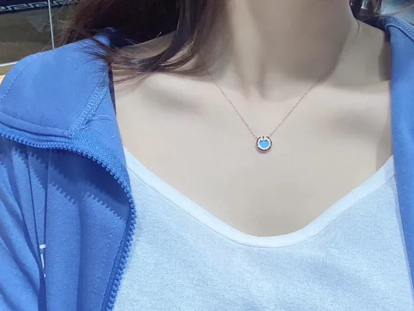 Tiffany  Co. Round T Inlay Pendant Necklace Rose-Tone with Blue Inlay product photo