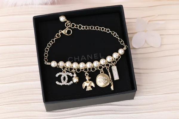 Chanel Bird CC Pearl-Effect Tassel Charm Bracelet Gold-Tone product view 4