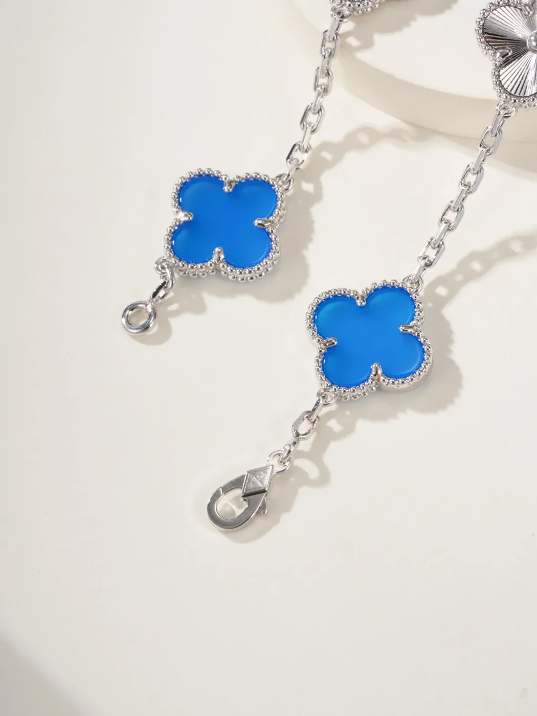 Van Cleef  Arpels Alhambra Blue Clover and Silver-Tone Knot Bracelet product view 4