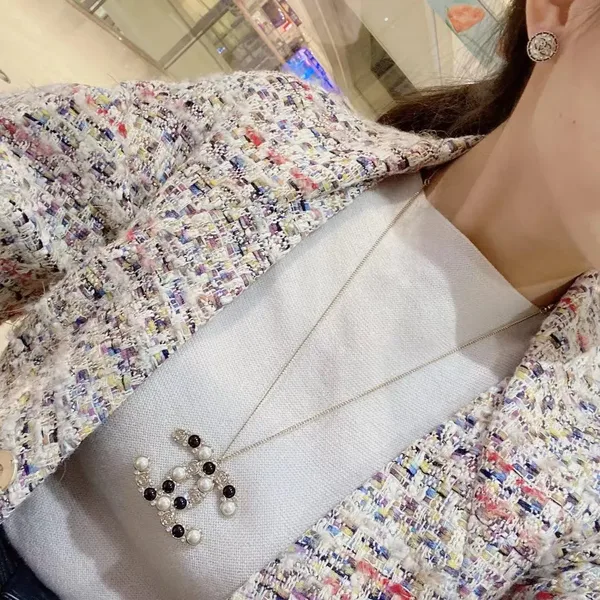 Chanel Oversized Pearl-Effect CC Pendant Necklace Black and Gold-Tone product view 7