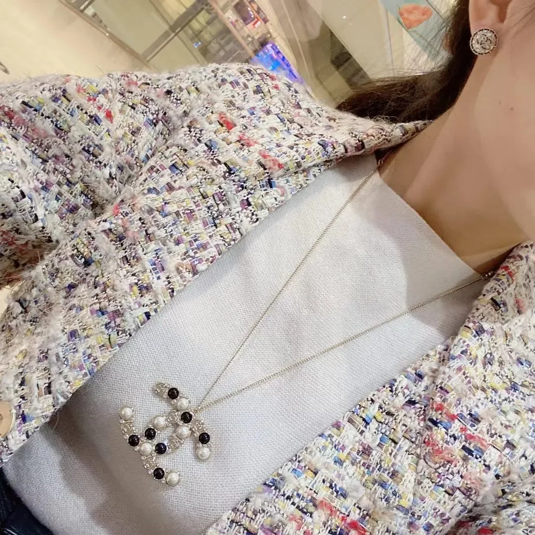 Chanel Oversized Pearl-Effect CC Pendant Necklace Black and Gold-Tone product view 7