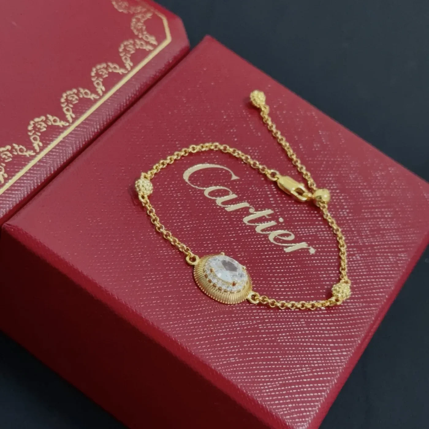 Cartier Gold-Tone Chain Bracelet with Round Pave-Effect Center product view 4