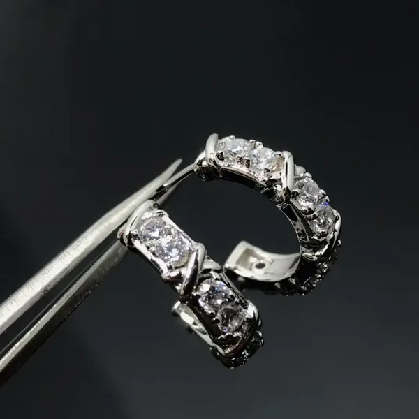 Tiffany  Co. Edge Cross Pavé-Effect Hoop Earrings Silver-Tone product photo