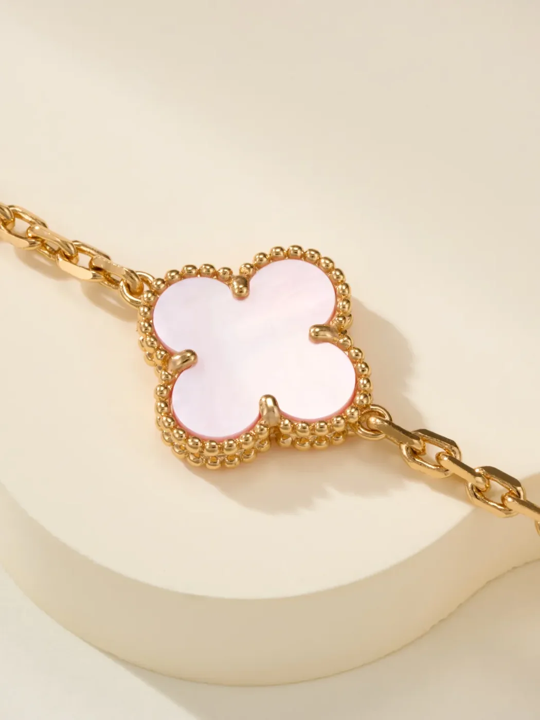 Van Cleef  Arpels Alhambra Pale Pink Clover and Gold-Tone Knot Bracelet product view 4
