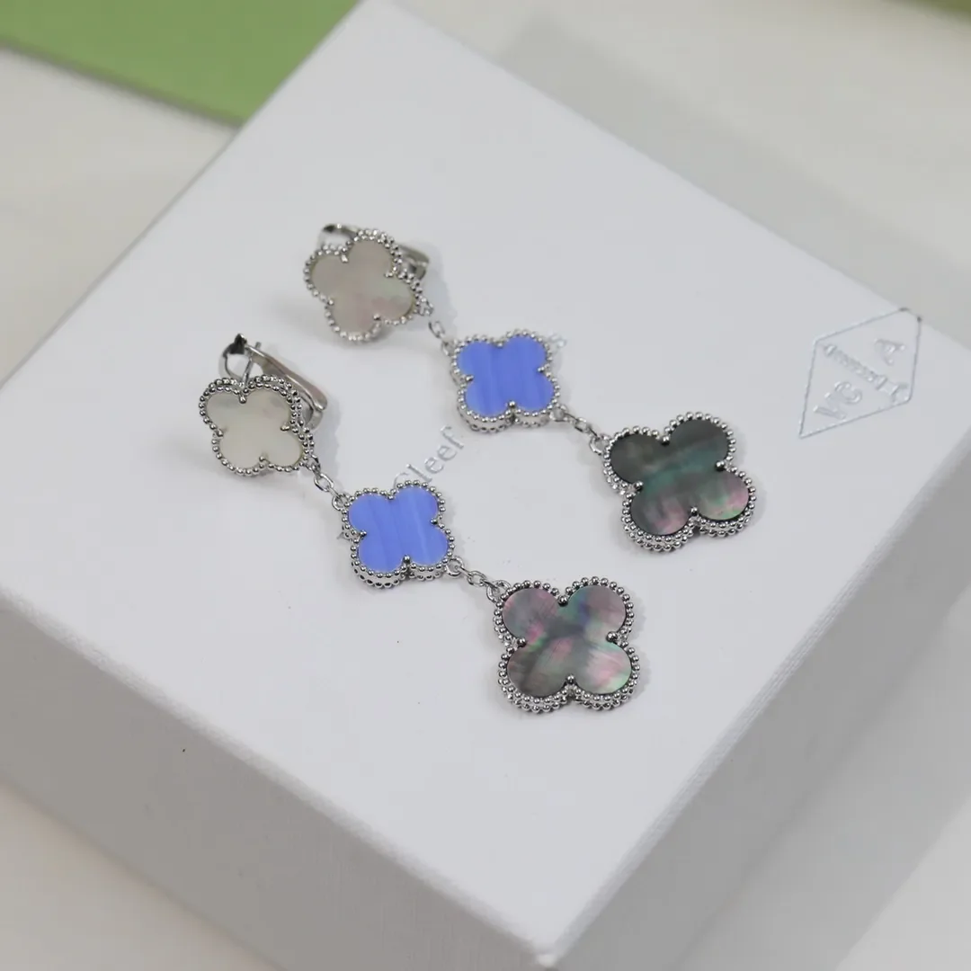 Van Cleef  Arpels Alhambra White Blue and Black Three-Motif Silver-Tone Drop Earrings product view 5