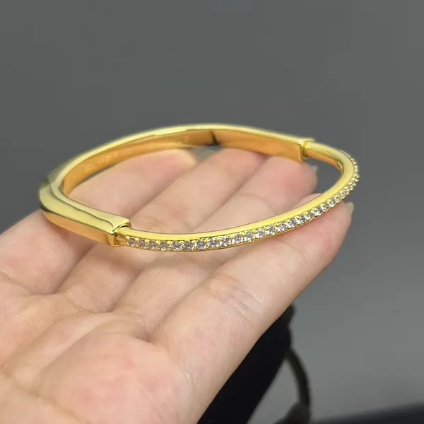 Tiffany  Co. Lock Half Pavé-Effect Hinged Bangle Gold-Tone product photo