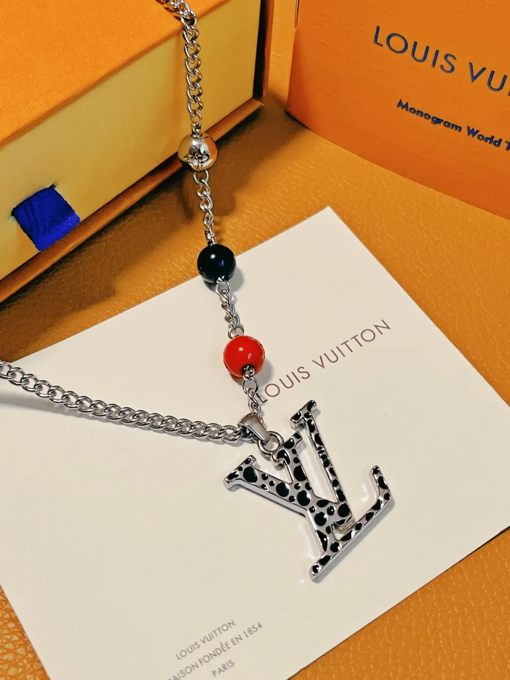 Louis Vuitton Dotted LV Monogram Bead Necklace Silver-Tone with Red and Black Beads product view 1