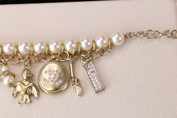 Chanel Bird CC Pearl-Effect Tassel Charm Bracelet Gold-Tone product view 7