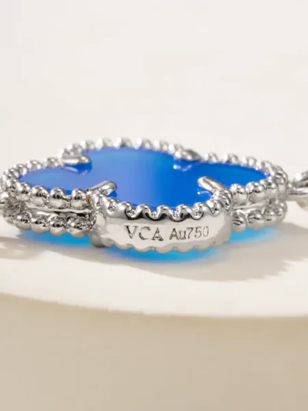 Van Cleef  Arpels Alhambra Blue Clover and Silver-Tone Knot Bracelet product view 10