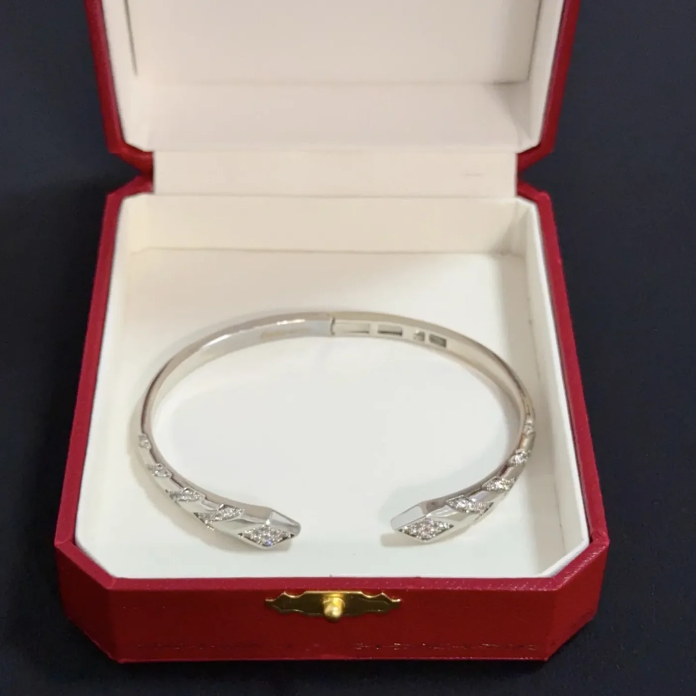 Cartier Silver-Tone Crossed Open Cuff with Pave-Effect Detail product view 4