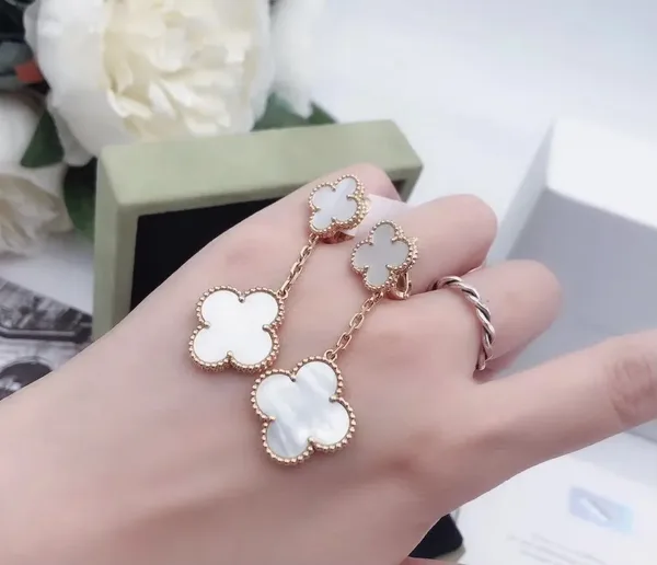 Van Cleef  Arpels Alhambra White Two-Motif Gold-Tone Drop Earrings product view 5