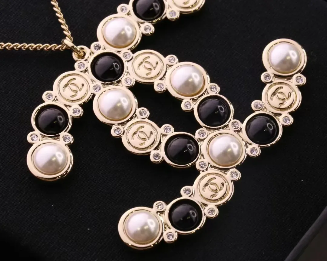 Chanel Oversized Pearl-Effect CC Pendant Necklace Black and Gold-Tone product view 3