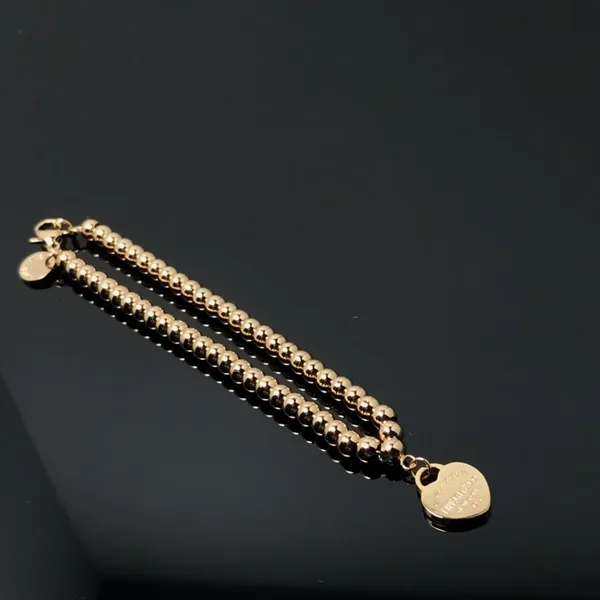 Tiffany  Co. Heart Tag Bead Bracelet Rose-Tone product view 3