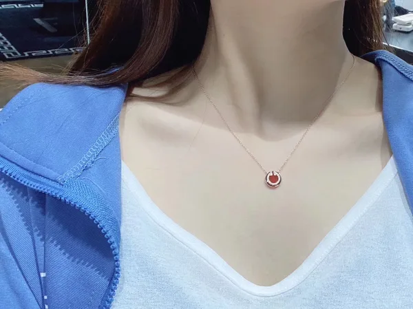 Tiffany  Co. Round T Inlay Pendant Necklace Rose-Tone with Red Inlay product photo