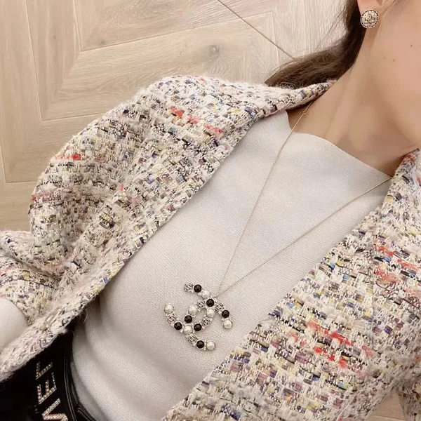 Chanel Oversized Pearl-Effect CC Pendant Necklace Black and Gold-Tone product view 6
