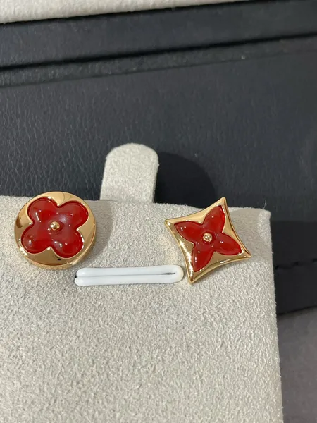 Louis Vuitton Asymmetric Sun and Star Stud Earrings Red Inlay and Gold-Tone product photo