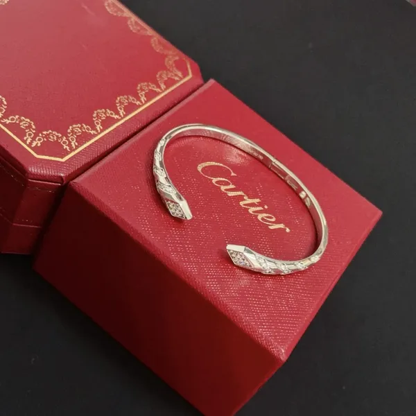 Cartier Silver-Tone Crossed Open Cuff with Pave-Effect Detail product view 3