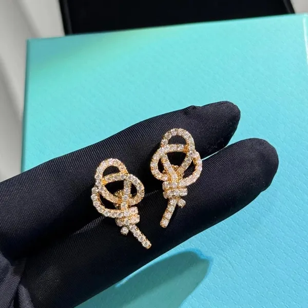 Tiffany  Co. Woven Knot Key Drop Earrings Rose-Tone product photo