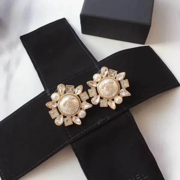 Chanel Pearl-Effect Floral Stud Earrings Gold-Tone product view 4