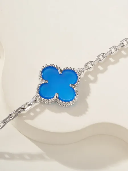 Van Cleef  Arpels Alhambra Blue Clover and Silver-Tone Knot Bracelet product view 5