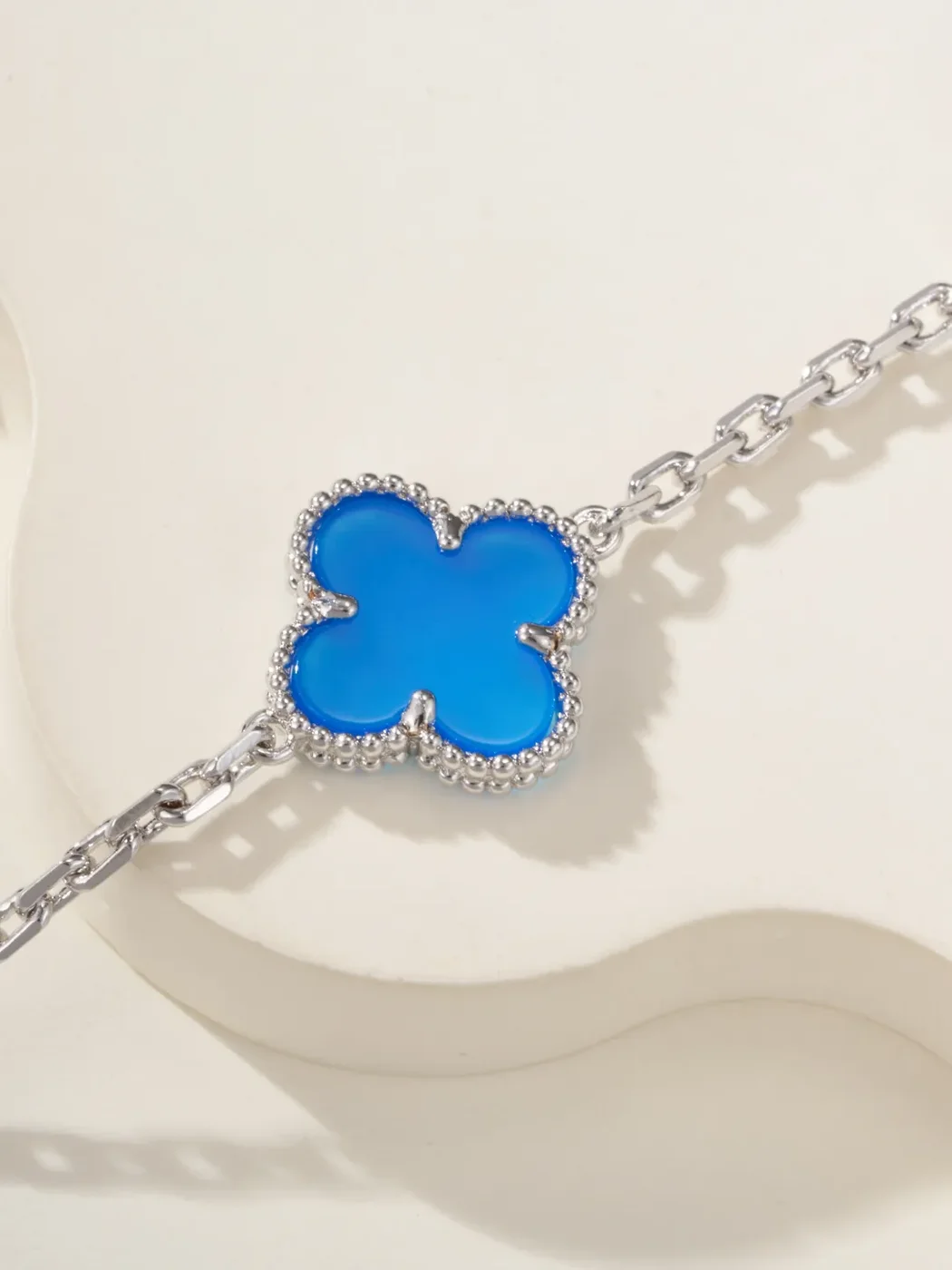 Van Cleef  Arpels Alhambra Blue Clover and Silver-Tone Knot Bracelet product view 5