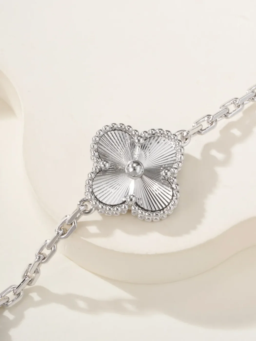 Van Cleef  Arpels Alhambra Blue Clover and Silver-Tone Knot Bracelet product view 7