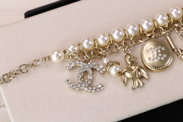 Chanel Bird CC Pearl-Effect Tassel Charm Bracelet Gold-Tone product view 8