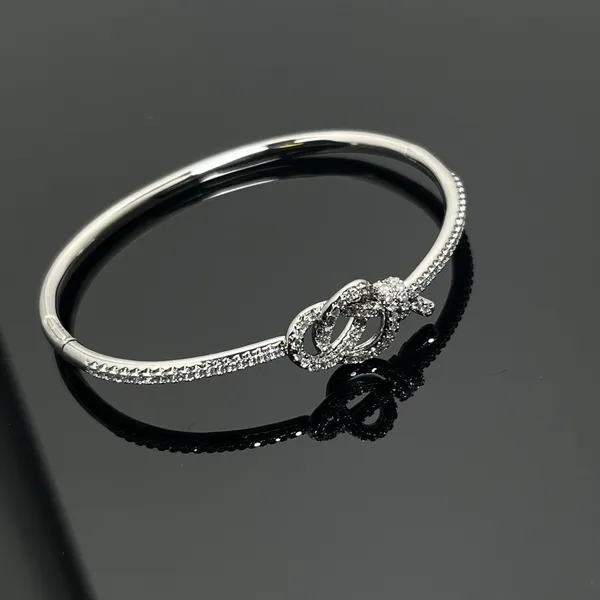Tiffany  Co. Woven Knot Round Pavé-Effect Bangle Silver-Tone product photo
