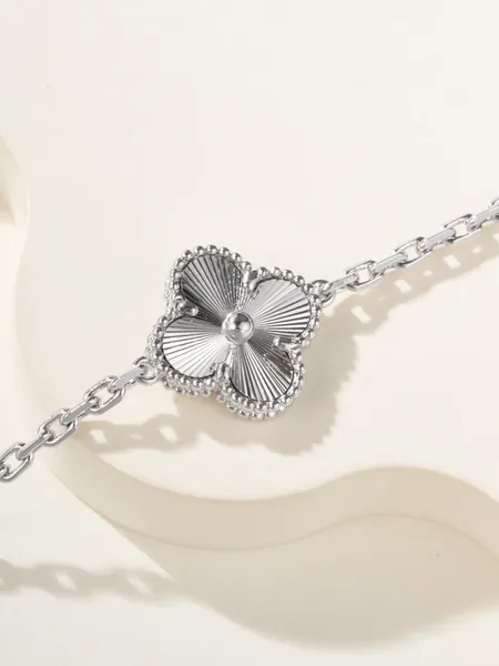 Van Cleef  Arpels Alhambra Blue Clover and Silver-Tone Knot Bracelet product view 8