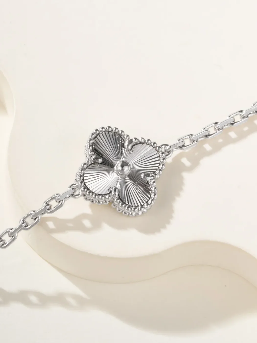 Van Cleef  Arpels Alhambra Blue Clover and Silver-Tone Knot Bracelet product view 8