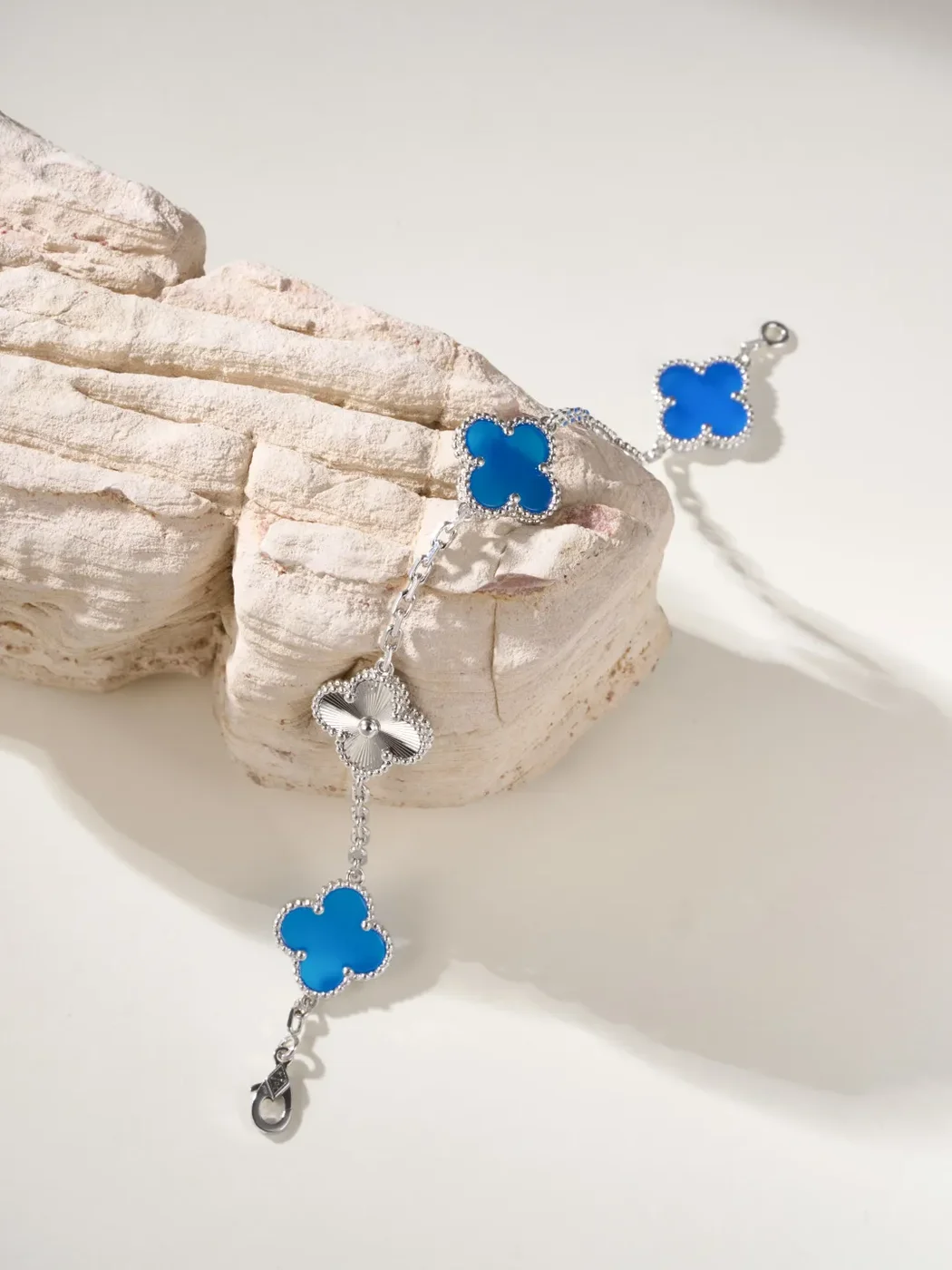 Van Cleef  Arpels Alhambra Blue Clover and Silver-Tone Knot Bracelet product view 2