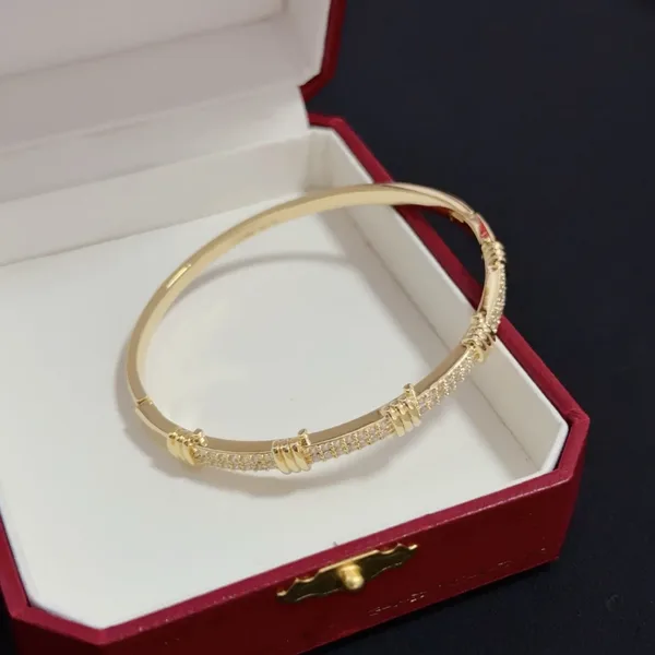 Cartier Gold-Tone Textured Bangle with Pave-Effect Details product view 4