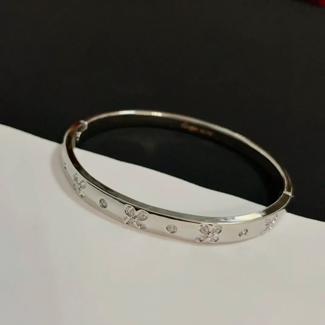 Cartier Love Silver-Tone Screw Bangle with Pave-Effect Details product view 3