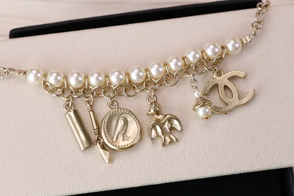Chanel Bird CC Pearl-Effect Tassel Charm Bracelet Gold-Tone product view 5