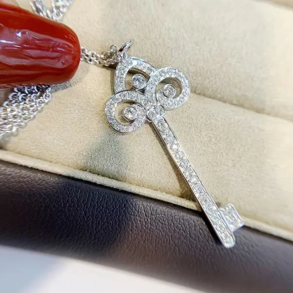 Tiffany  Co. Full Pavé-Effect Woven Crown Key Necklace Silver-Tone product photo