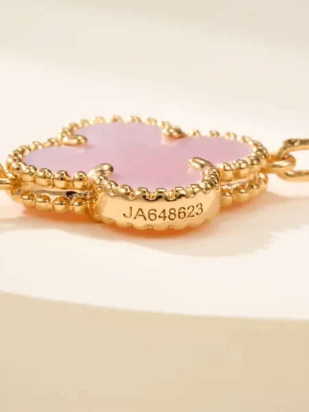 Van Cleef  Arpels Alhambra Pale Pink Clover and Gold-Tone Knot Bracelet product view 10
