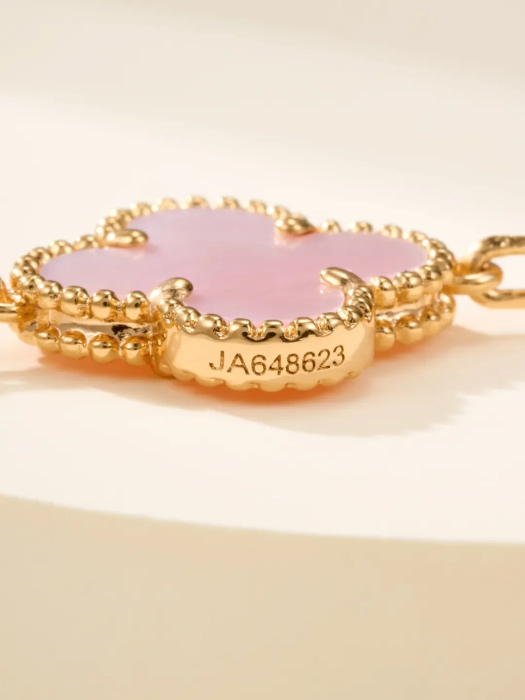 Van Cleef  Arpels Alhambra Pale Pink Clover and Gold-Tone Knot Bracelet product view 10