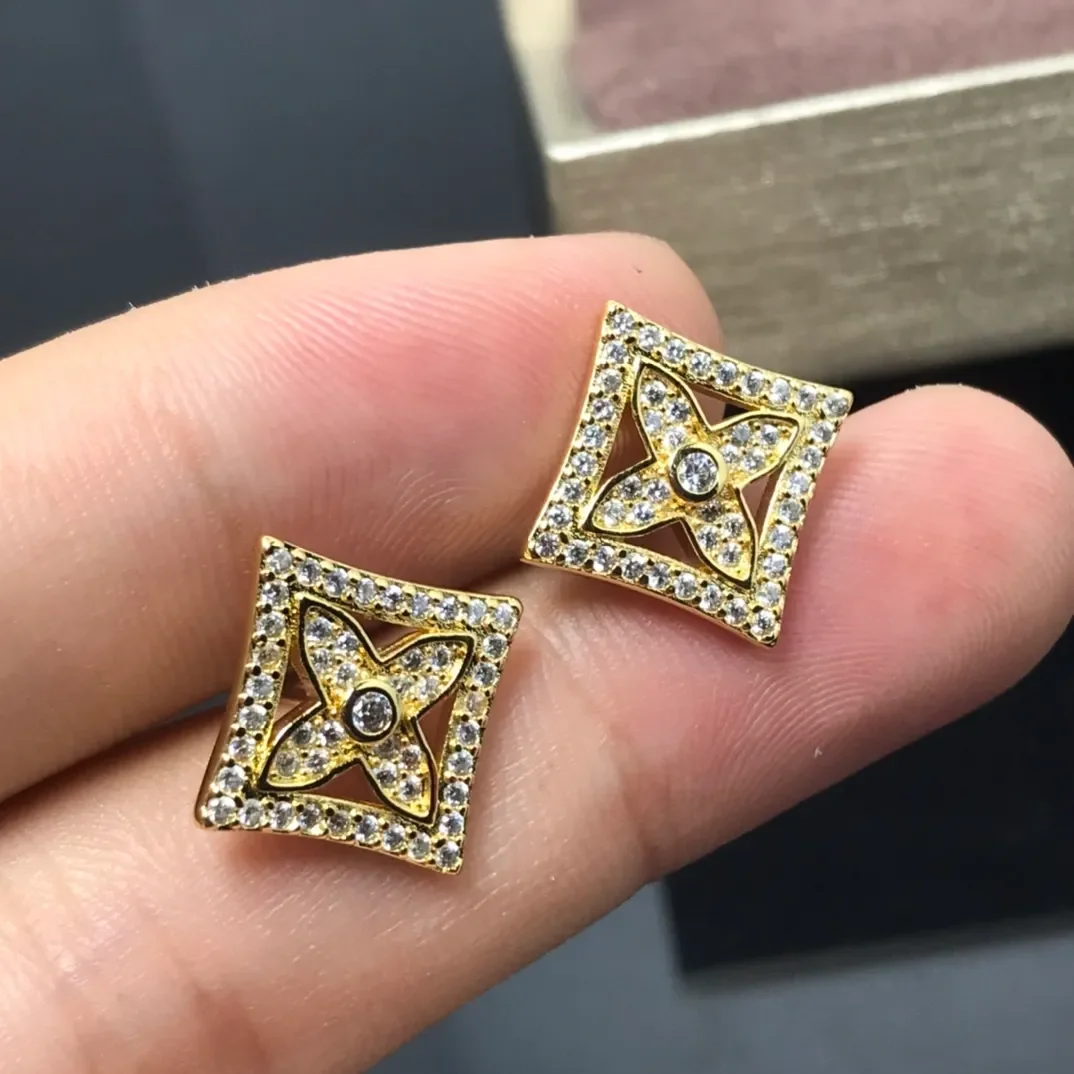 Louis Vuitton Full Pavé Star Stud Earrings Gold-Tone product view 1