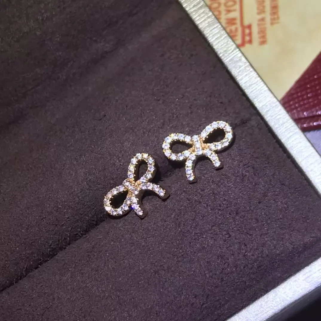 Tiffany  Co. Pavé-Effect Bow Stud Earrings Silver-Tone product view 1