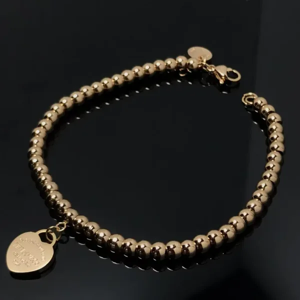 Tiffany  Co. Heart Tag Bead Bracelet Rose-Tone product photo