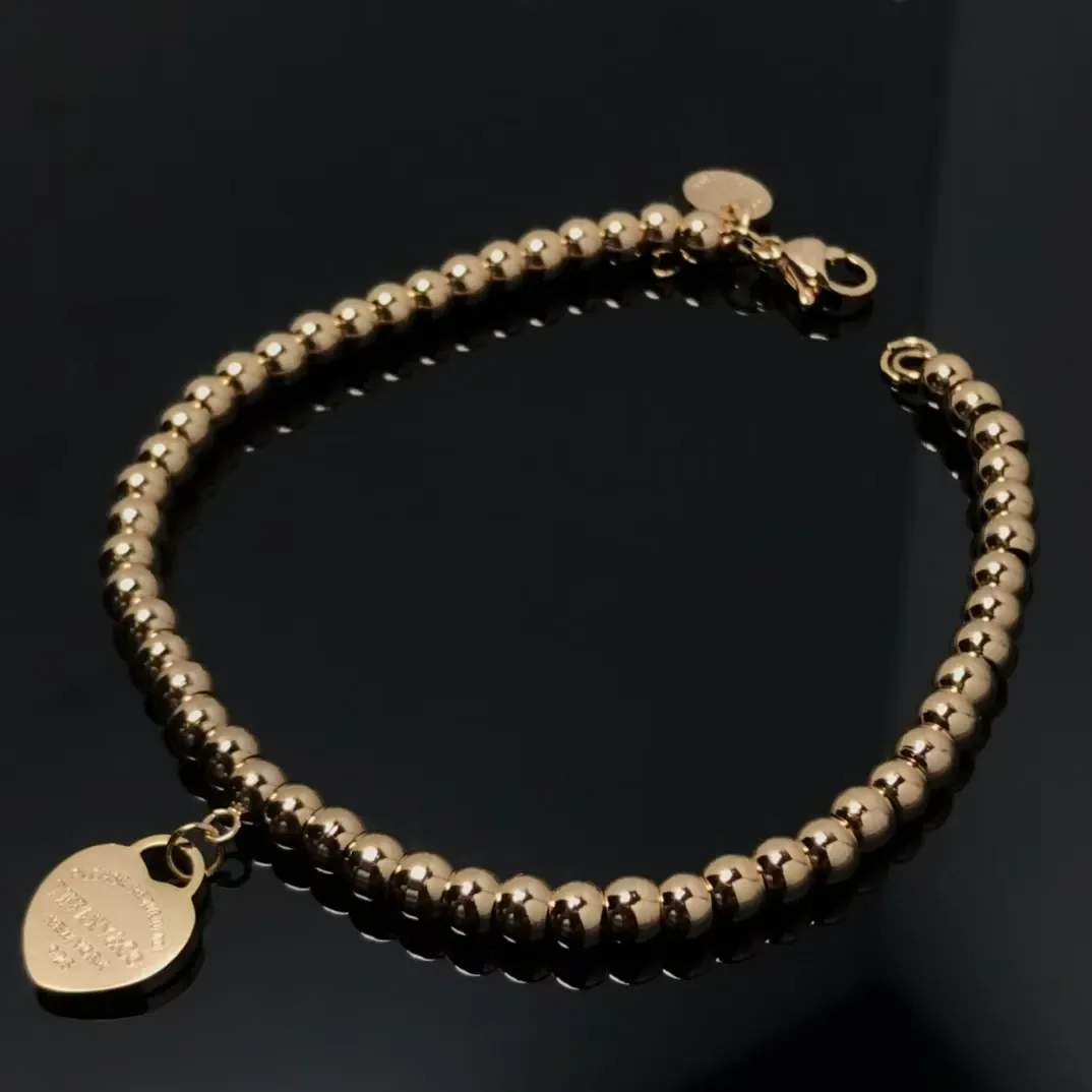 Tiffany  Co. Heart Tag Bead Bracelet Rose-Tone product view 1