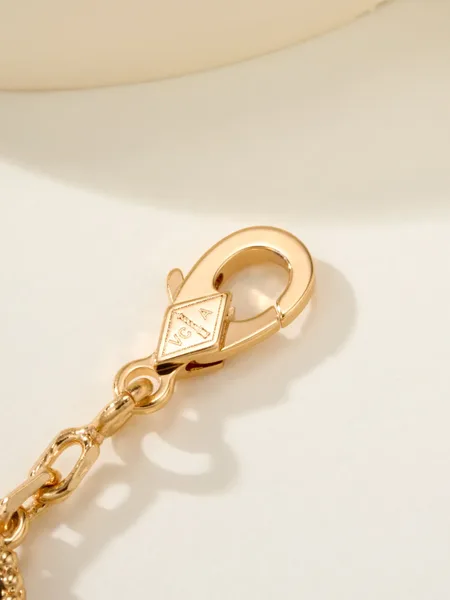 Van Cleef  Arpels Alhambra Pale Pink Clover and Gold-Tone Knot Bracelet product view 9
