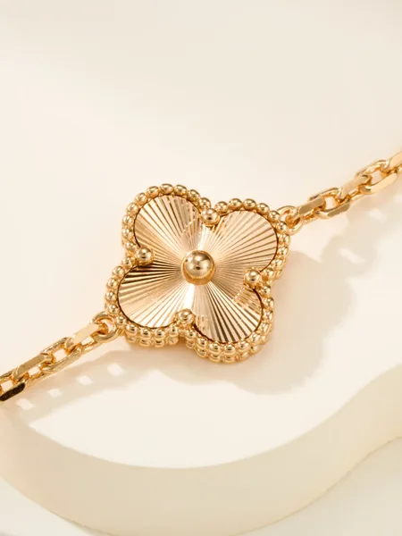 Van Cleef  Arpels Alhambra Pale Pink Clover and Gold-Tone Knot Bracelet product view 7